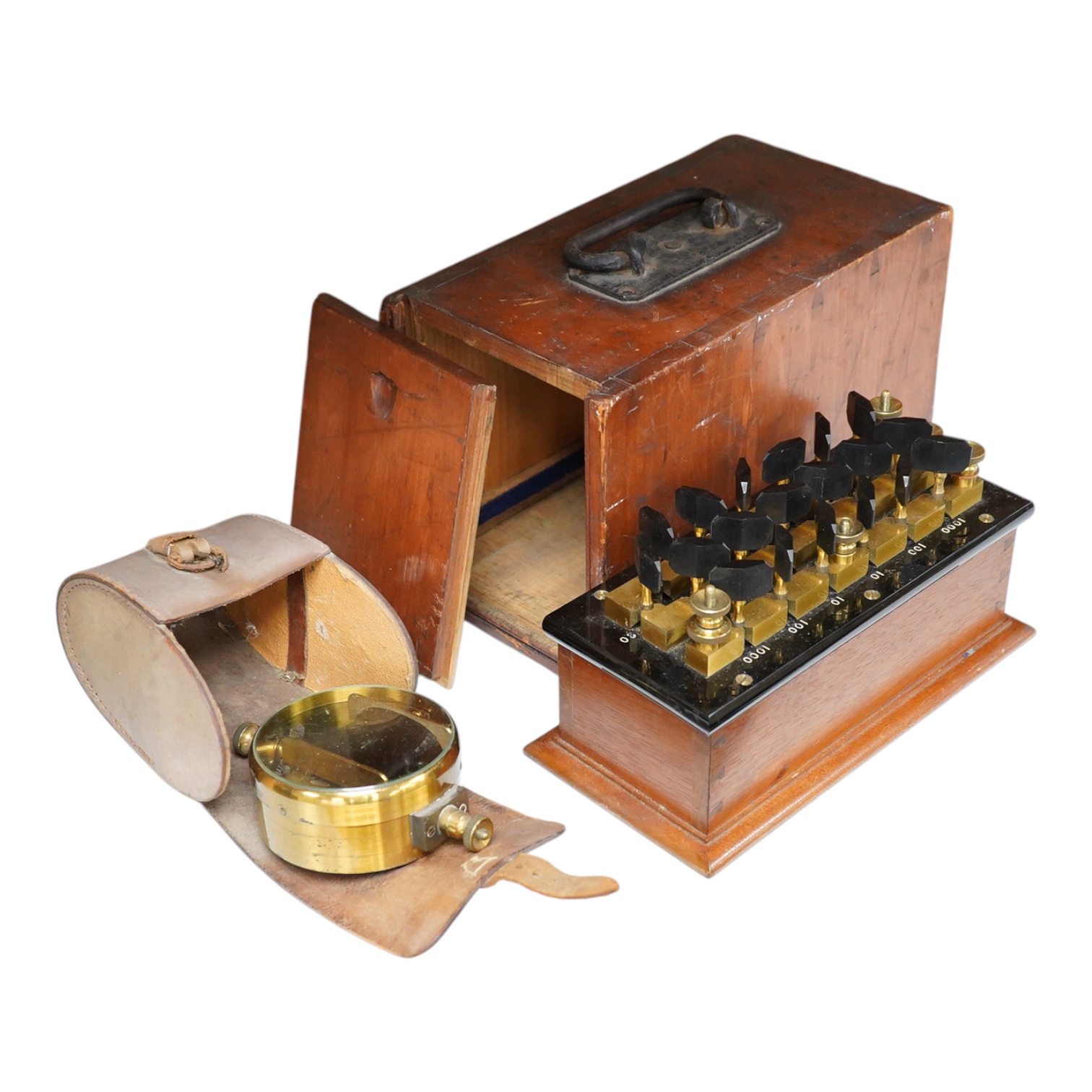 An early 20th century mahogany cased Wheatstone Bridge by C.J. Simmons, London, intended to measure electrical resistance, the case dimensions; 26cm x 14cm x 16.5cm, together with a leather cased brass Galvanometer, inte